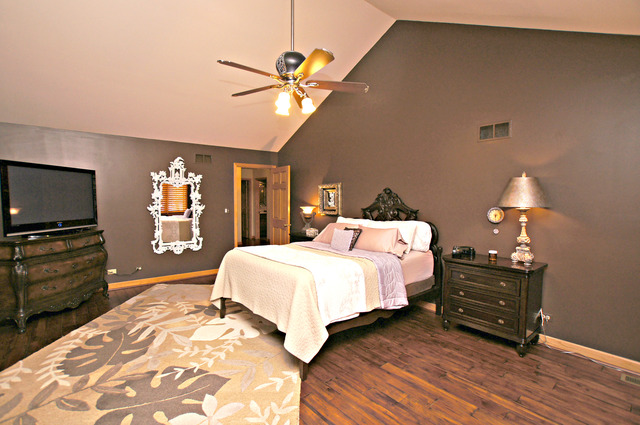 11 Tartan Ridge Road Burr Ridge, IL 60527 - Photo 15 of 25 a bedroom with a bed and wooden floor