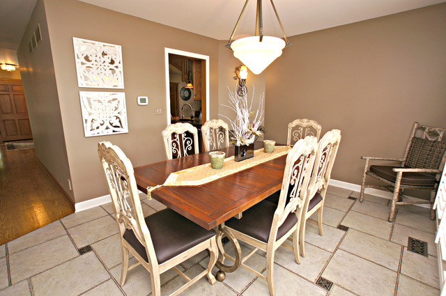 11 Tartan Ridge Road Burr Ridge, IL 60527 - Photo 7 of 25 a dining room with furniture a chandelier and window