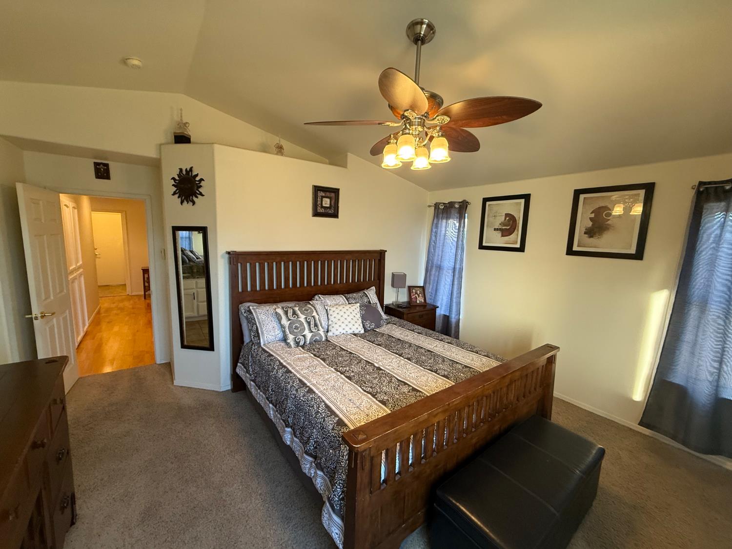3124 Summer Lane Madera, CA 93637 - Photo 17 of 30 a bed sitting in a bedroom next to a window