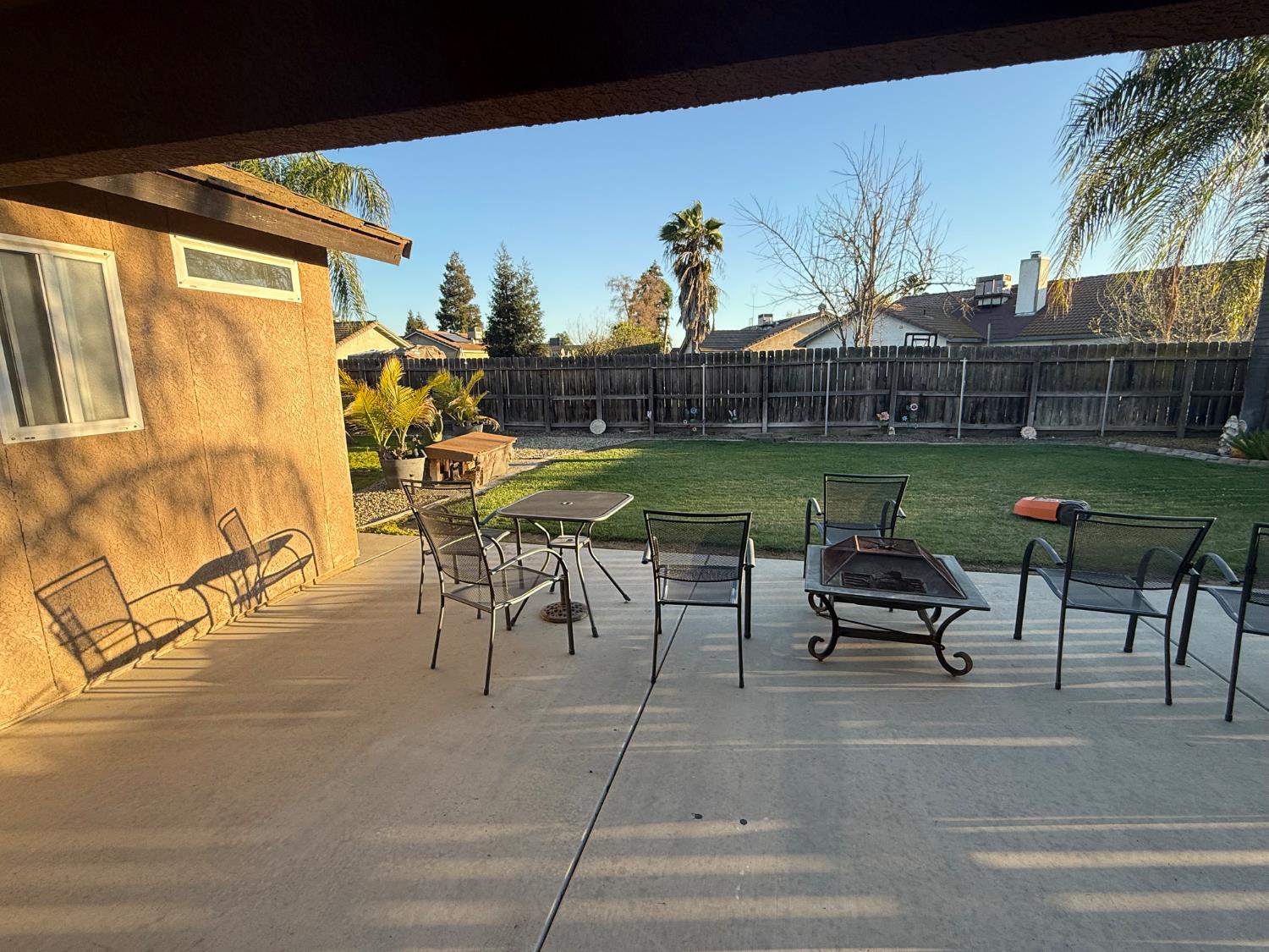 3124 Summer Lane Madera, CA 93637 - Photo 23 of 30 a view of a swimming pool with a table and chairs