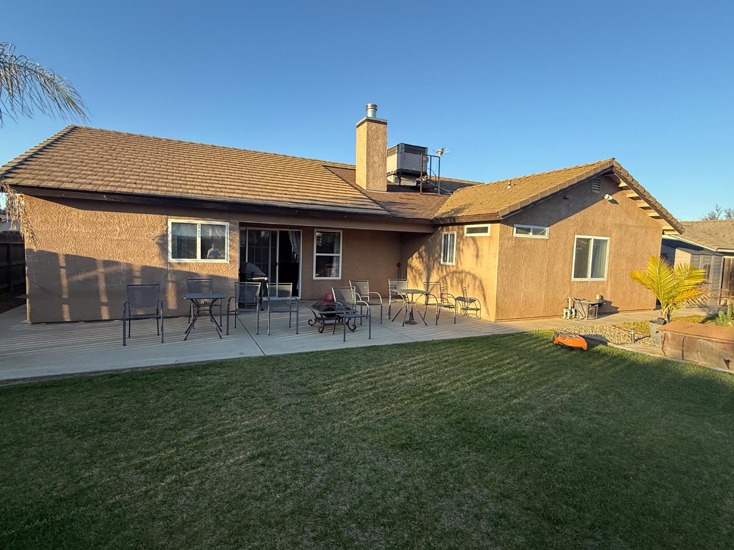 3124 Summer Lane Madera, CA 93637 - Photo 29 of 30 a front view of a house with a garden
