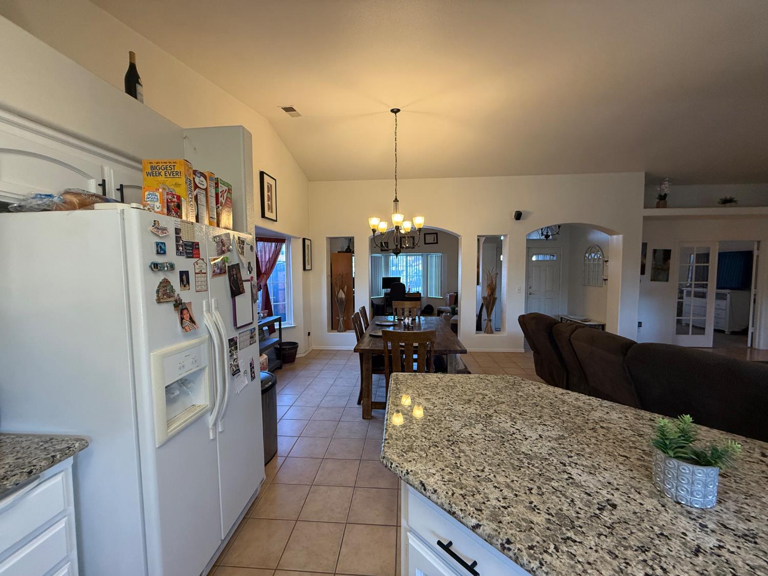 3124 Summer Lane Madera, CA 93637 - Photo 5 of 30 a living room with furniture and a chandelier