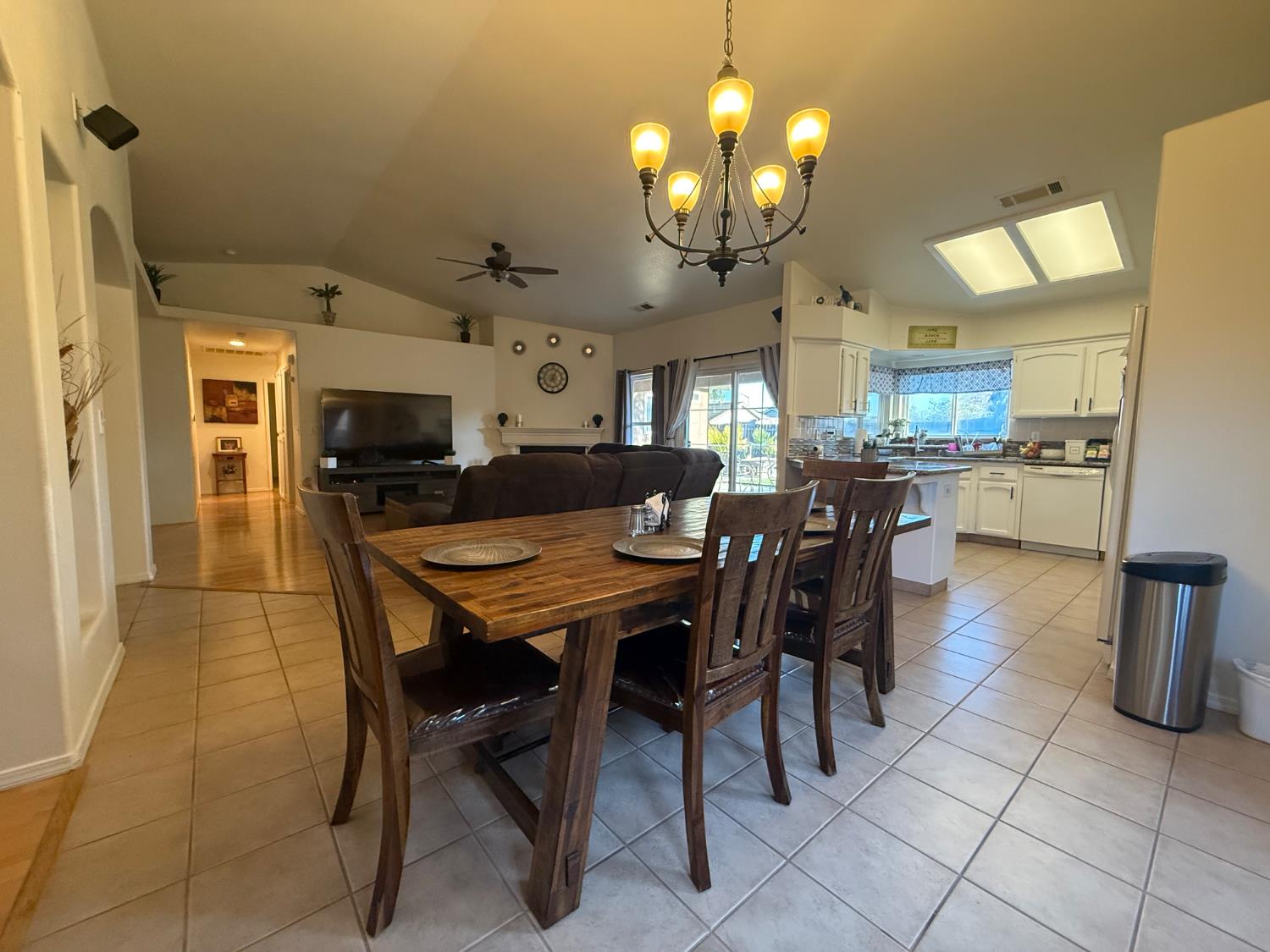 3124 Summer Lane Madera, CA 93637 - Photo 10 of 30 a view of a dining room with furniture and chandelier