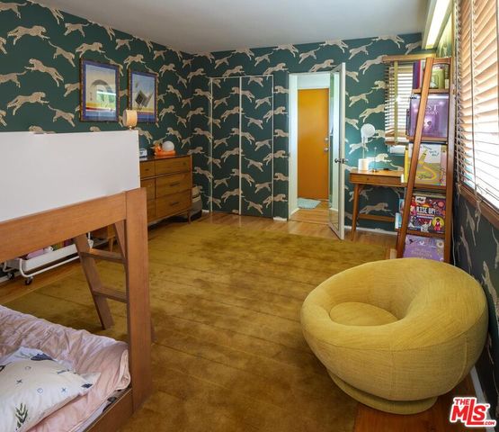 a view of livingroom with furniture and window