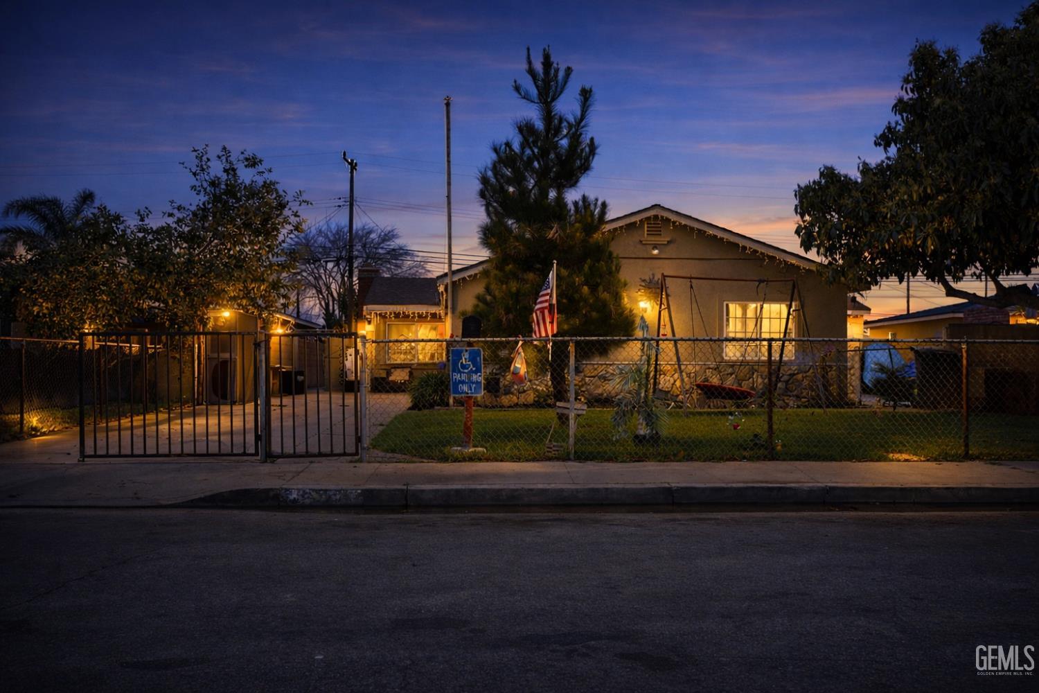 Undisclosed Address Oxnard, CA 93033 - Photo 3 of 14 a front view of a house with a garden