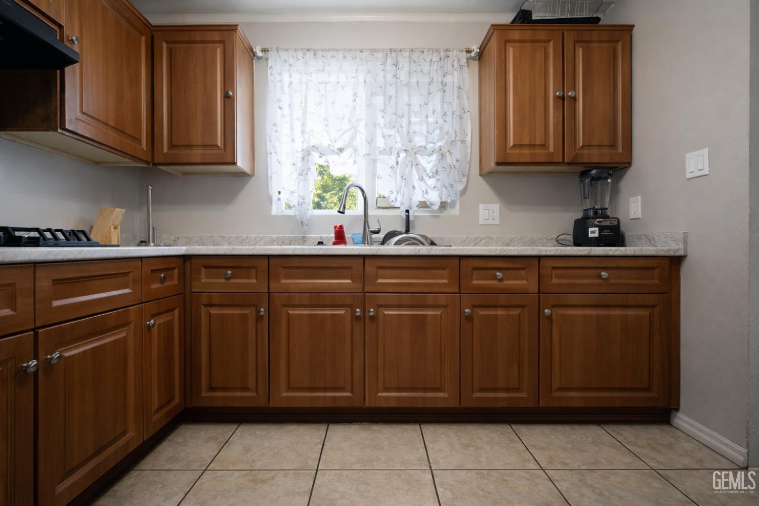 Undisclosed Address Oxnard, CA 93033 - Photo 7 of 14 a kitchen with stainless steel appliances granite countertop a sink and cabinets