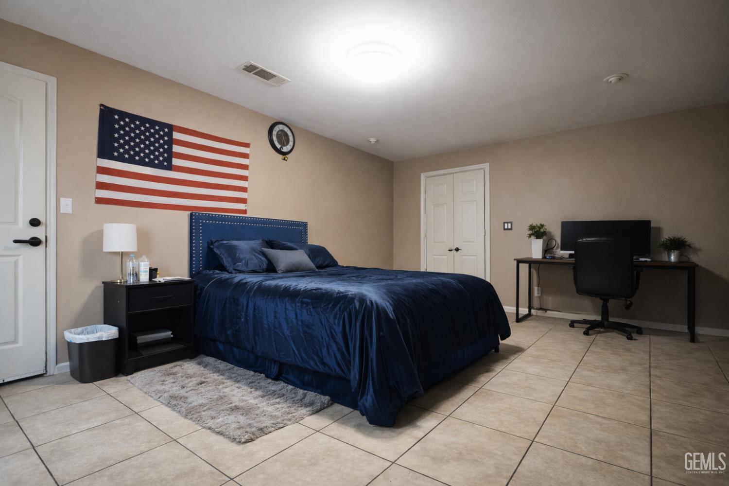Undisclosed Address Oxnard, CA 93033 - Photo 10 of 14 a bedroom with a bed and a desk