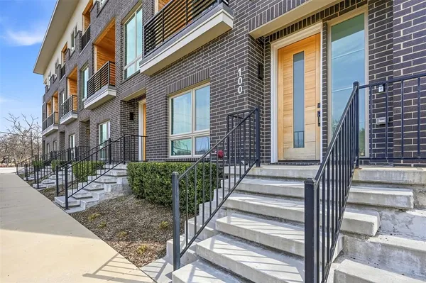 a view of a brick building front of house