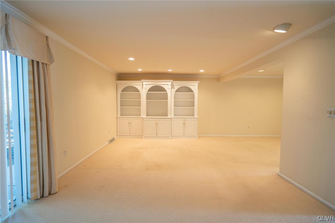 150 Springhouse Road Allentown, PA 18104 - Photo 11 of 38 Living Room with Custom Built In Bookshelves