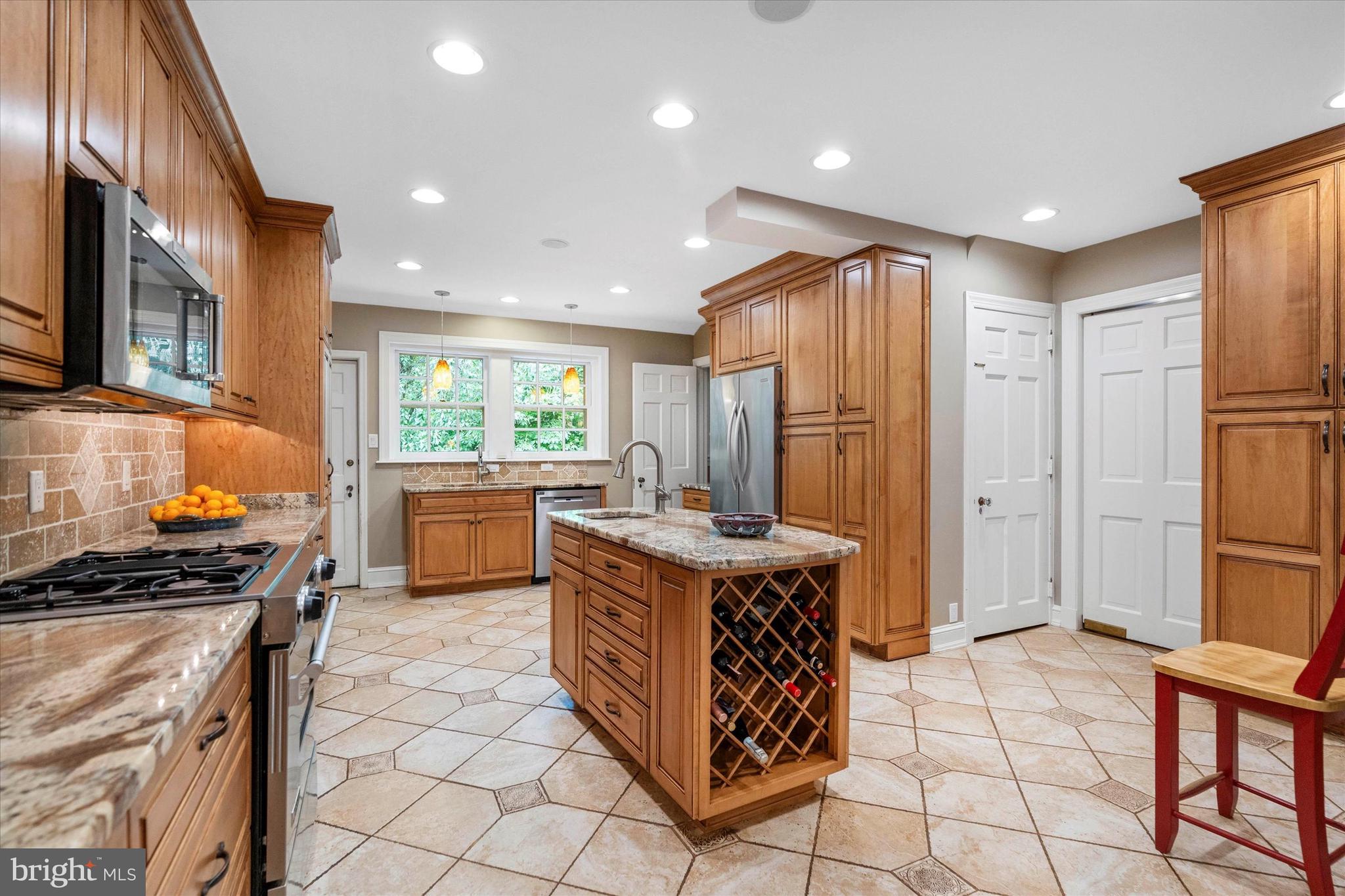 1003 Berkeley Road Wilmington, DE 19807 - Photo 13 of 65 Custom Cabinets, Island w/ Winerack & Bar Sink