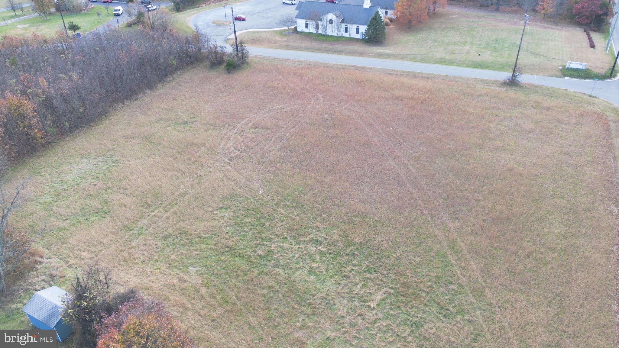 17403 Old Baltimore Road Olney, MD 20832 - Photo 2 of 5 a view of a dry yard with wooden fence