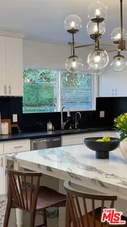 $949,000 | 4427 South Wilton Place, Los Angeles, CA 90062