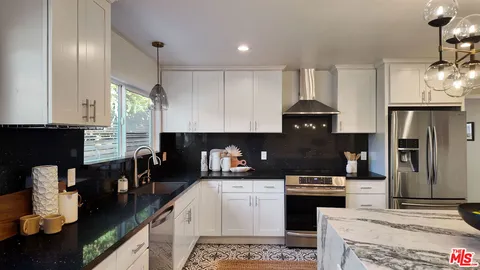 $949,000 | 4427 South Wilton Place, Los Angeles, CA 90062