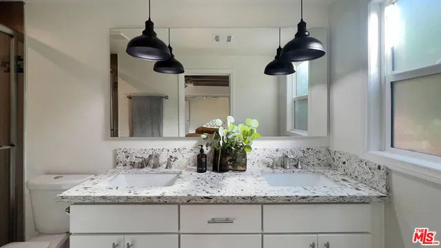 $949,000 | 4427 South Wilton Place, Los Angeles, CA 90062