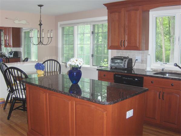 47 Stonecleave Road Boxford, MA 01921 - Photo 3 of 26 a kitchen with granite countertop a sink chairs and window