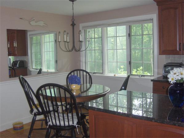 47 Stonecleave Road Boxford, MA 01921 - Photo 4 of 26 a view of a dining room with furniture window and outside view