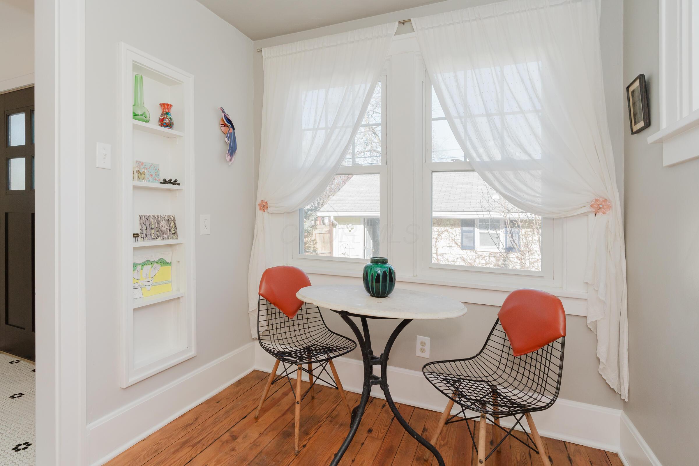 278 Crestview Road Columbus, OH 43202 - Photo 19 of 50 The kitchen nook features a wall of built-ins and lovely light to start your day with your coffee or tea.
