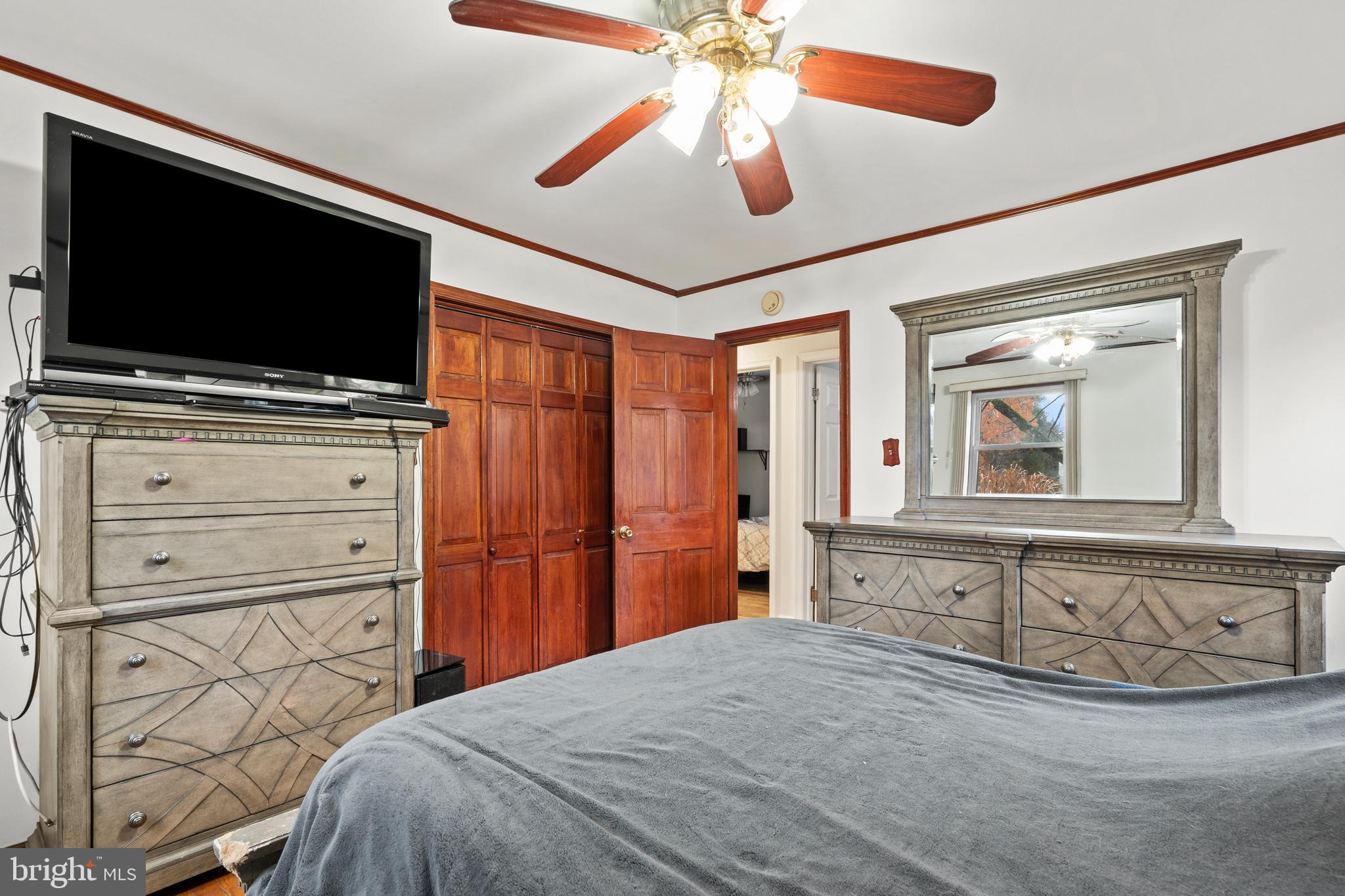 1538 Temple Road Pottstown, PA 19465 - Photo 12 of 29 a bedroom with a bed and a flat screen tv