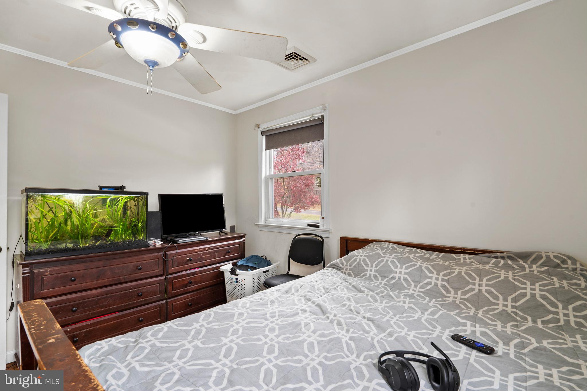 1538 Temple Road Pottstown, PA 19465 - Photo 14 of 29 a bedroom with a bed and flat screen tv