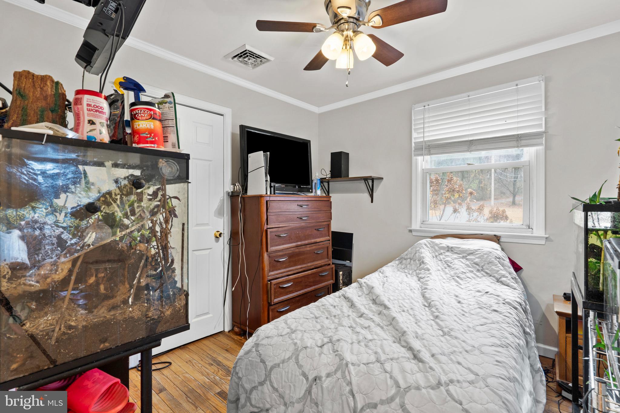 1538 Temple Road Pottstown, PA 19465 - Photo 15 of 29 a bedroom with a bed and a flat tv screen on dresser