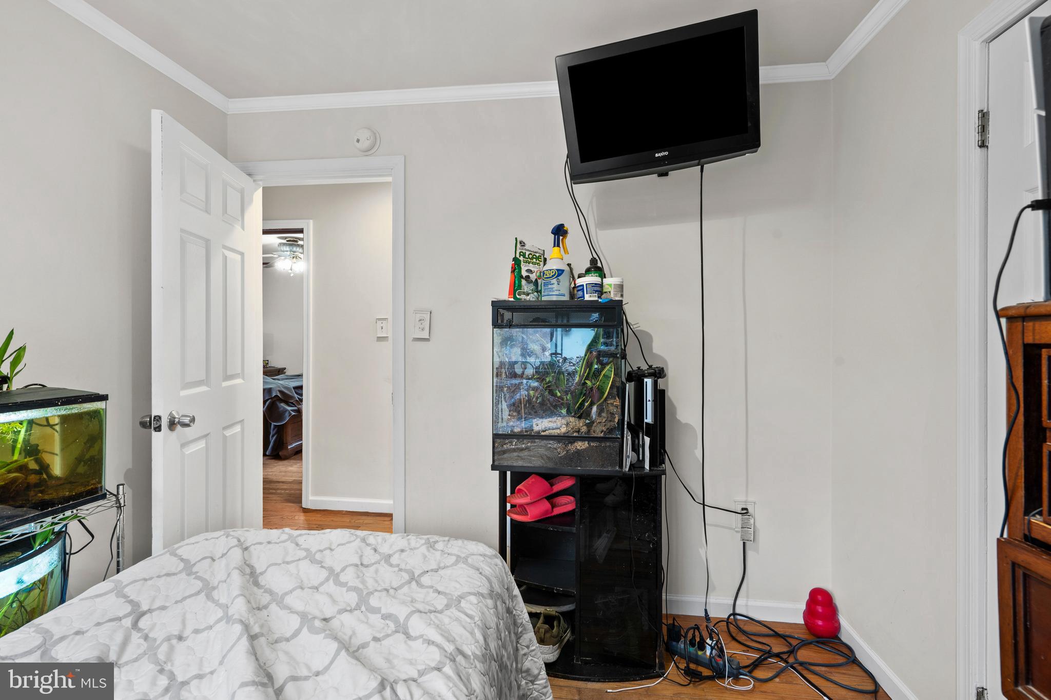 1538 Temple Road Pottstown, PA 19465 - Photo 16 of 29 a bedroom with a bed and a flat screen tv
