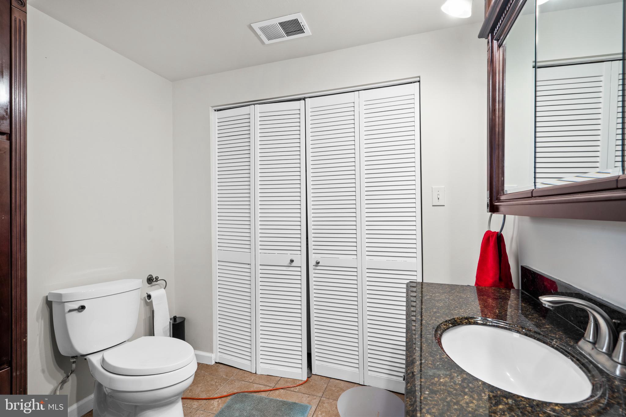 1538 Temple Road Pottstown, PA 19465 - Photo 17 of 29 a bathroom with a sink a toilet and a mirror