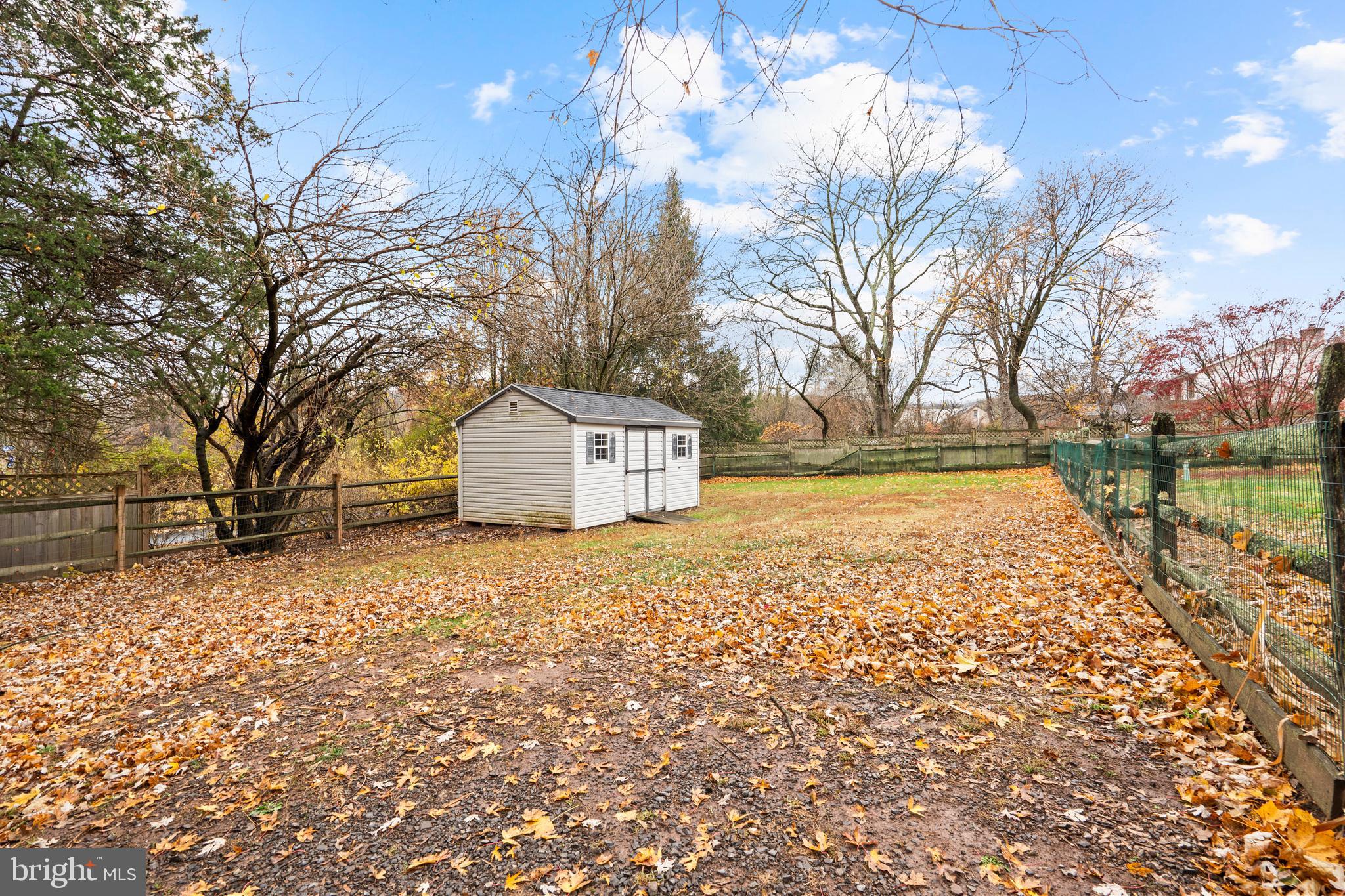 1538 Temple Road Pottstown, PA 19465 - Photo 24 of 29 a view of a yard with a house and a large tree