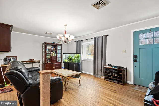 a view of a livingroom with furniture and window