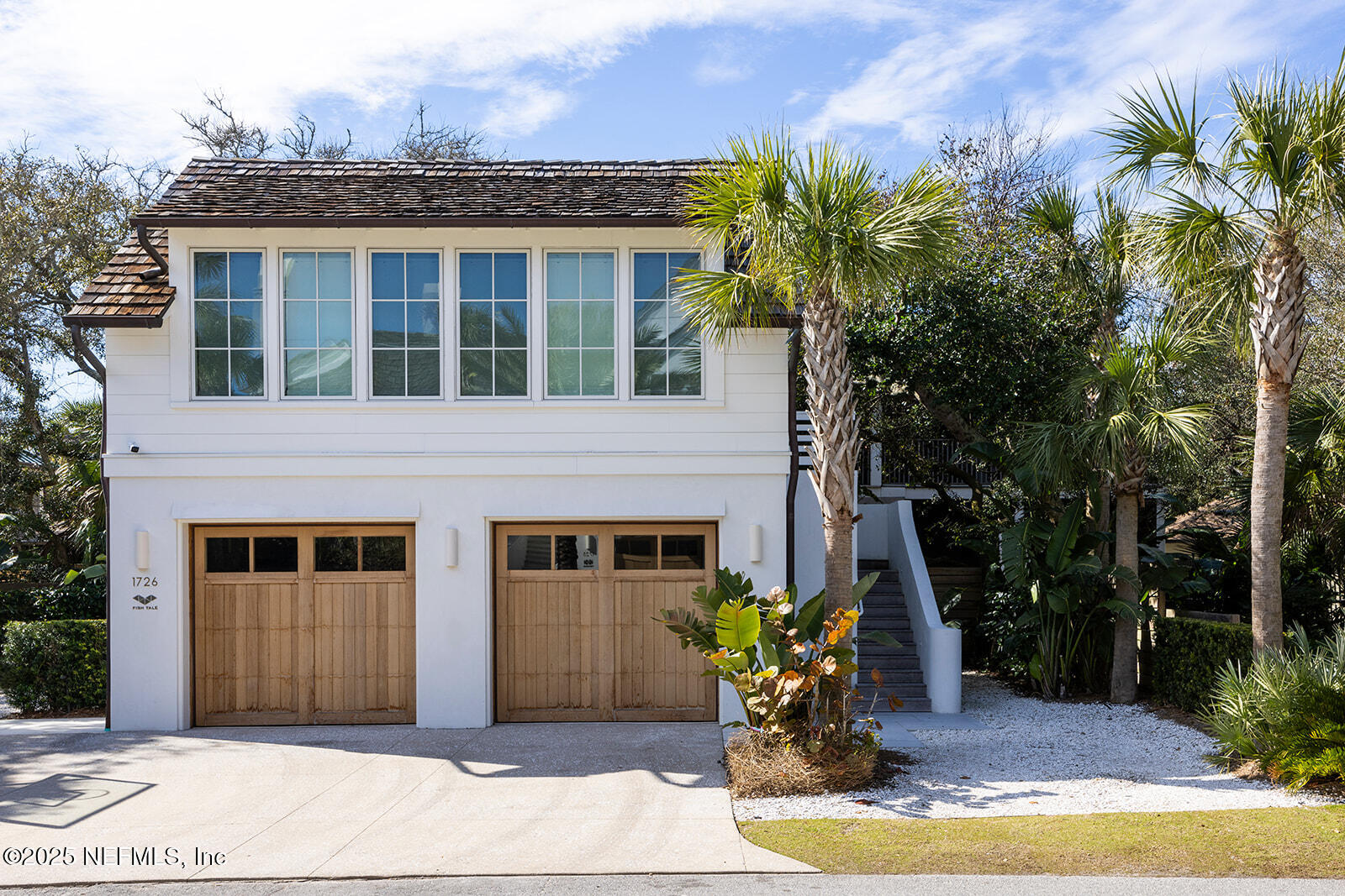 1725 Beach Avenue Atlantic Beach, FL 32233 - Photo 11 of 14 a front view of a house with a yard