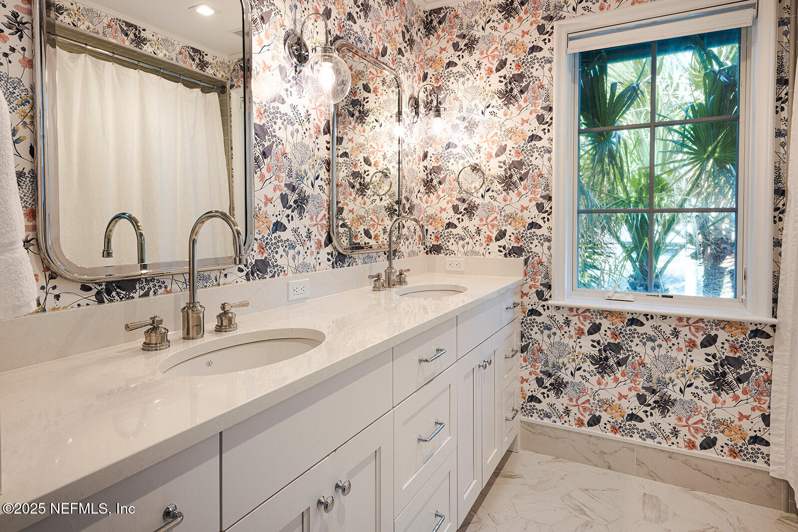 1725 Beach Avenue Atlantic Beach, FL 32233 - Photo 5 of 14 a bathroom with a double vanity sink and a window