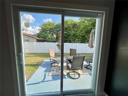 a view of swimming pool from a room