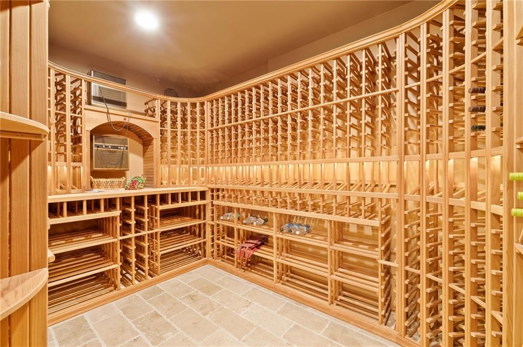 322 Edwards Brook Lane Canton, GA 30115 - Photo 71 of 99 a view of walk in closet with empty racks
