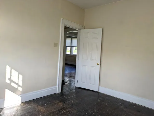 a bathroom with a sink toilet and mirror