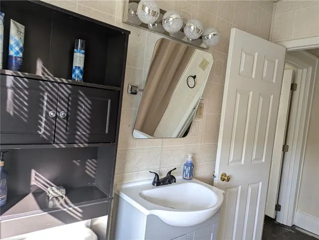 a bathroom with a sink and a tub