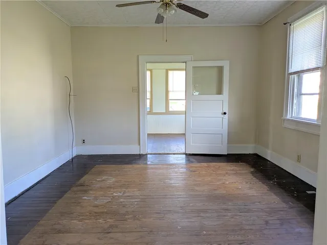 an empty room with windows