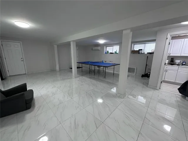 a view of a livingroom with furniture