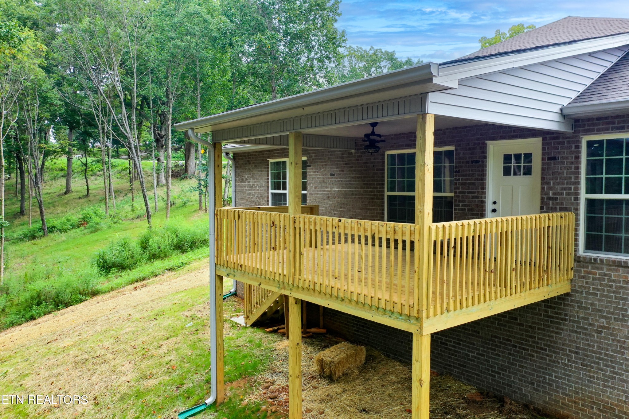 3650 Big Springs Road Friendsville, TN 37737 - Photo 5 of 26 a view of a chair and table in the backyard
