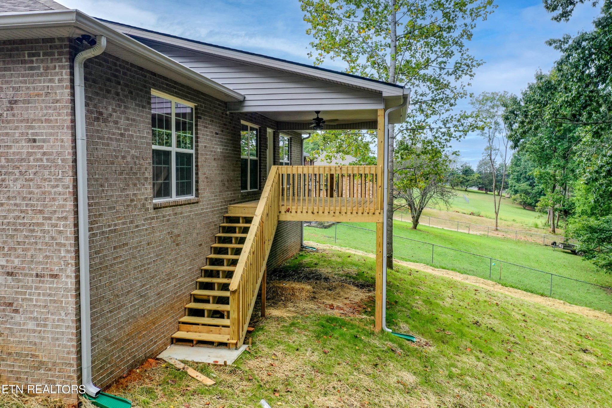 3650 Big Springs Road Friendsville, TN 37737 - Photo 7 of 26 a front view of a house with a yard