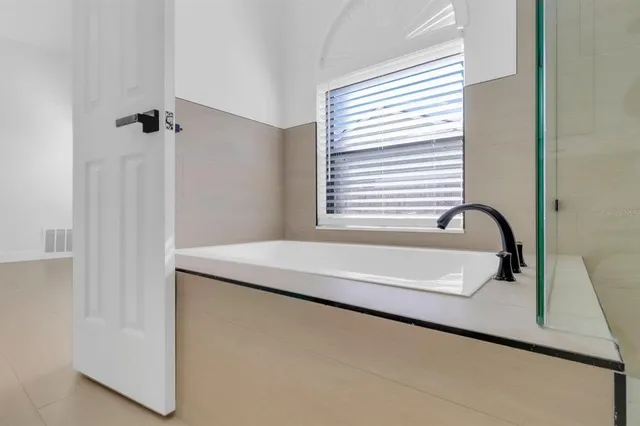 a bathroom with a bathtub