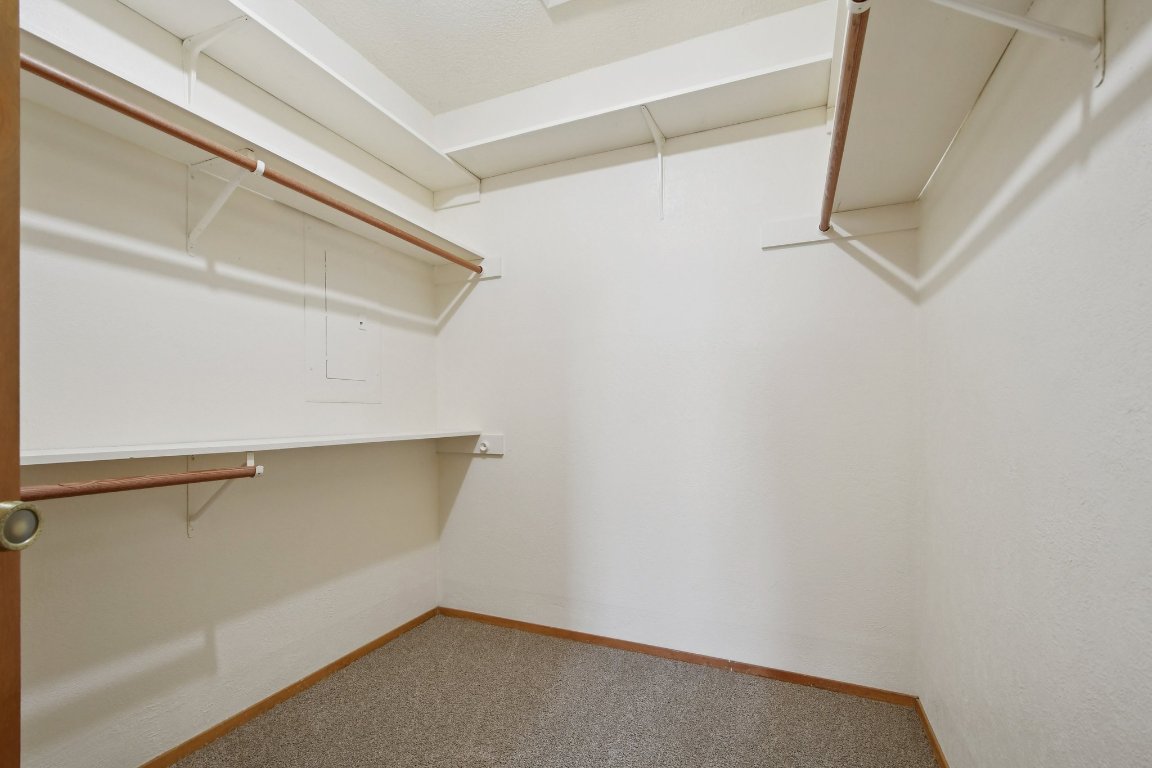21009 Fawn Ridge Drive Lago Vista, TX 78645 - Photo 20 of 40 a view of an empty walk in closet