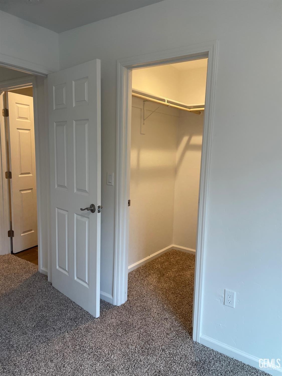 Undisclosed Address Bakersfield, CA 93308 - Photo 12 of 17 an empty room with closet and a bathroom
