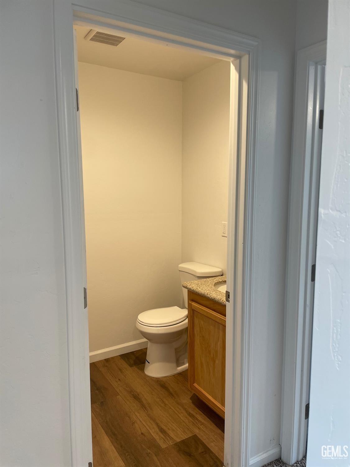 Undisclosed Address Bakersfield, CA 93308 - Photo 13 of 17 a bathroom with a toilet and a shower