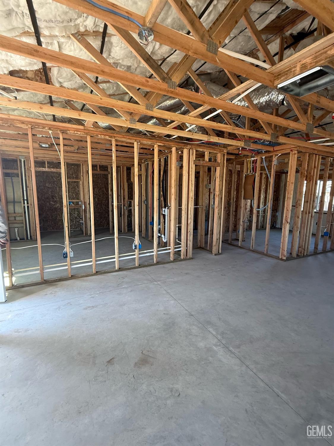 Undisclosed Address Bakersfield, CA 93308 - Photo 7 of 17 a view of an empty room with wooden walls