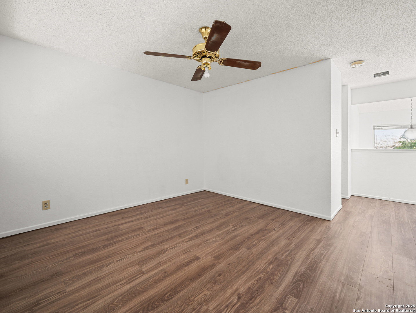 11520 Huebner Road, Unit 302 San Antonio, TX 78230 - Photo 18 of 28 a view of room with wooden floor