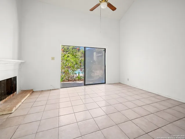 a view of an empty room and window