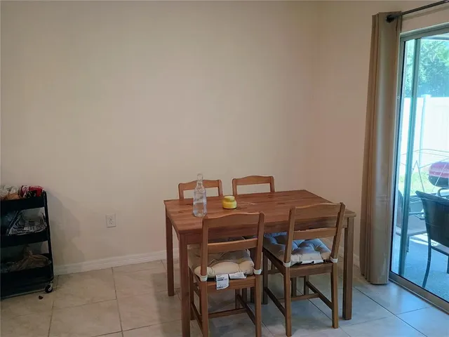 a view of a workspace with furniture