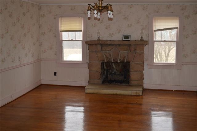 877 Bells Mill Road Pelham, TN 37366 - Photo 5 of 20 a view of a livingroom with wooden floor and a window
