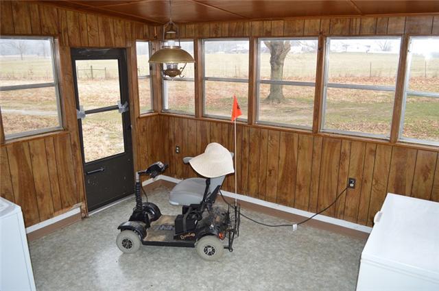 877 Bells Mill Road Pelham, TN 37366 - Photo 8 of 20 a view of a room with a window and dining table