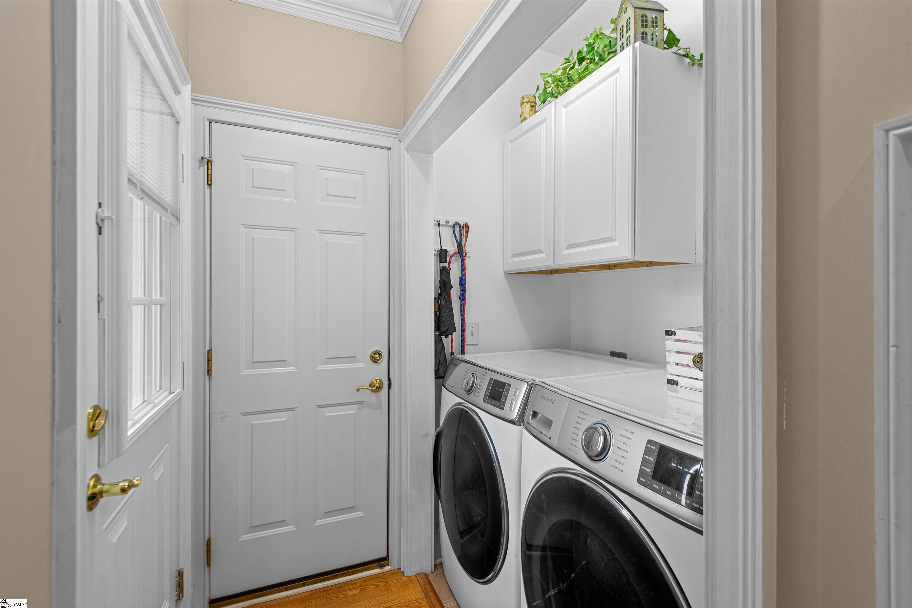 107 Grove Park Drive Anderson, SC 29621 - Photo 18 of 35 Entrance into garage. Laundry sink in the garage.