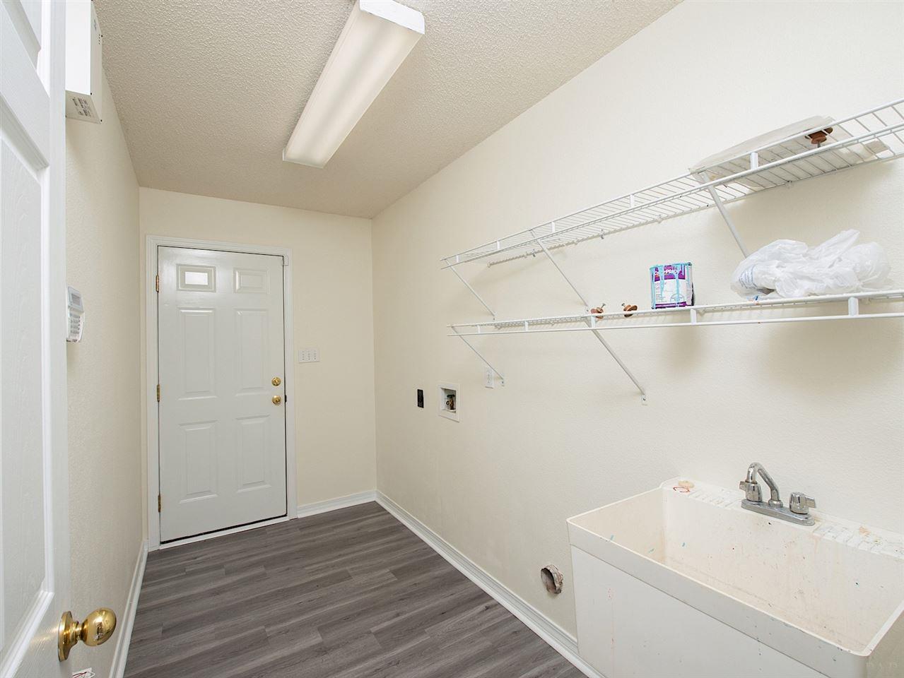 6852 Da Lisa Road Milton, FL 32583 - Photo 24 of 35 Leads to 2 Car Garage